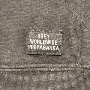 Black OBEY hoodie size SMALL